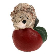 Dekoratyvinė ežiuko figūrėlė ant obuolio 7,5 cm keramika