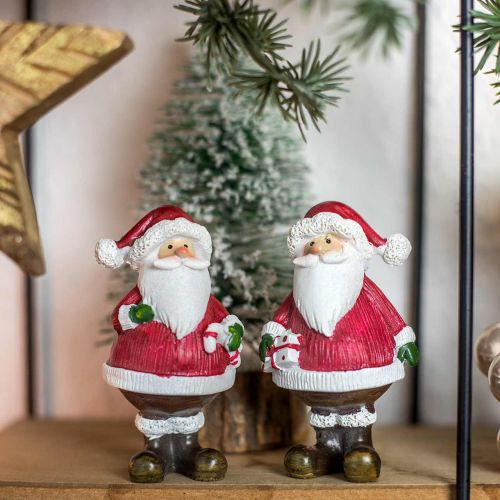 Floristik24 Deco figūrėlė Kalėdų Senelis su saldainiu/dovana H8,5cm 4vnt