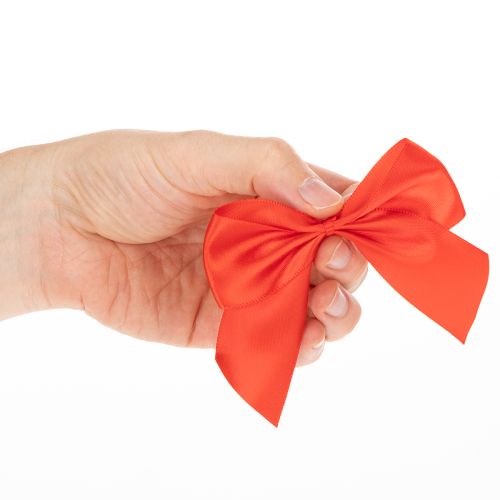 Dekoratyvinis raudonas kaspinėlis, surištas rankdarbiams ir pakavimui, 11 cm, 25 vnt. | Floristik24.lt