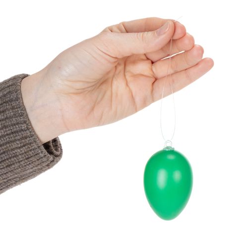 daiktų Velykinių kiaušinių papuošalai pavasarinei dekoracijai namams ar sodui. Spalvingi dekoratyviniai elementai, 6 cm, 24 vnt.