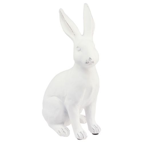 Floristik24 Triušio sėdėjimo dekoratyvinė triušio dirbtinio akmens dekoracija balta H27cm