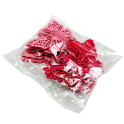 Floristik24 Mediniai drugeliai pakabinti rožinės spalvos 8cm - 10cm 24vnt