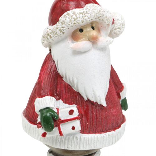 Floristik24 Deco figūrėlė Kalėdų Senelis su saldainiu/dovana H8,5cm 4vnt