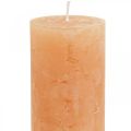 Floristik24 Vienspalvės žvakės Oranžinės persikų stulpinės žvakės 50×100mm 4vnt