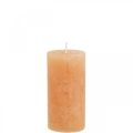 Floristik24 Vienspalvės žvakės Oranžinės persikų stulpinės žvakės 50×100mm 4vnt