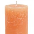 Floristik24 Vienspalvės žvakės Oranžinės persikų stulpinės žvakės 60×100mm 4vnt