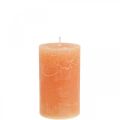Floristik24 Vienspalvės žvakės Oranžinės persikų stulpinės žvakės 60×100mm 4vnt