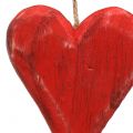 Floristik24 Medinės širdelės pakabinti raudonos, baltos 11,5cm 4vnt