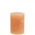 Floristik24 Vienspalvės žvakės Oranžinės persikų stulpinės žvakės 70×100mm 4vnt
