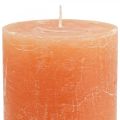 Floristik24 Vienspalvės žvakės Oranžinės persikų stulpinės žvakės 85×120mm 2vnt