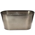 Ovalus vazonas su reljefiniu