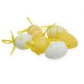 Floristik24 Dekoratyviniai velykiniai kiaušiniai geltoni, balti asilai. 6,5cm 12vnt
